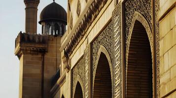 A close up of a building with arches and a clock tower photo