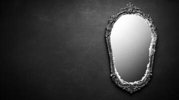 Ornate Oval Mirror on a Dark Textured Wall Surface photo