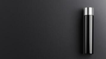 Sleek Black Thermos On Dark Surface photo