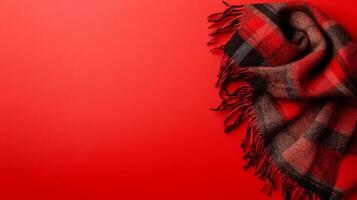 Red Plaid Scarf On Solid Background photo