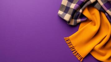 Textured Fabrics Folded Gracefully on a Solid Color photo