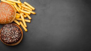 Fast Food Assortment on a Dark Surface photo