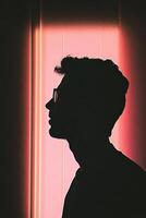 Silhouette of Man with Light Behind photo