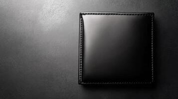 Black Leather Wallet Displayed on a Dark Surface photo