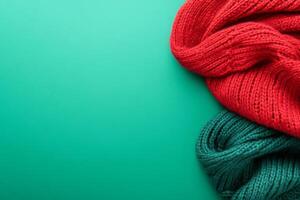 Red and Green Knitted Fabric on a Solid Background photo