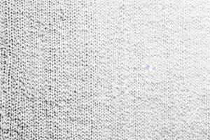 Detailed White Knitted Fabric with Visible Texture photo