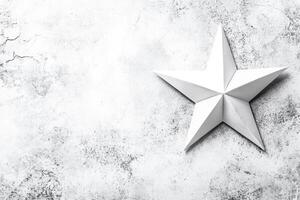 White Paper Star on a Textured Background photo