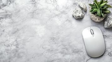 Silver Wireless Mouse on a Marble Tabletop photo