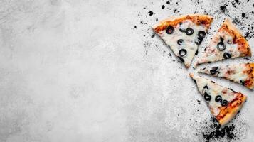 Pizza Slices with Olives on a Textured Surface photo
