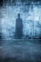 Silhouette of a Figure on a Rough Background photo