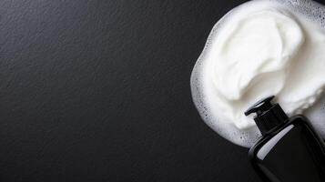 Shaving Cream on a Black Tabletop photo