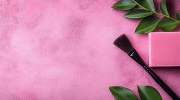 Aesthetic Pink Background with Cosmetic Brush and Soap photo