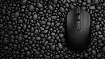 Black Wireless Mouse on Textured Surface photo