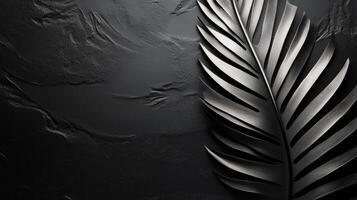 Black Textured Background with Gray Leaf Detail photo