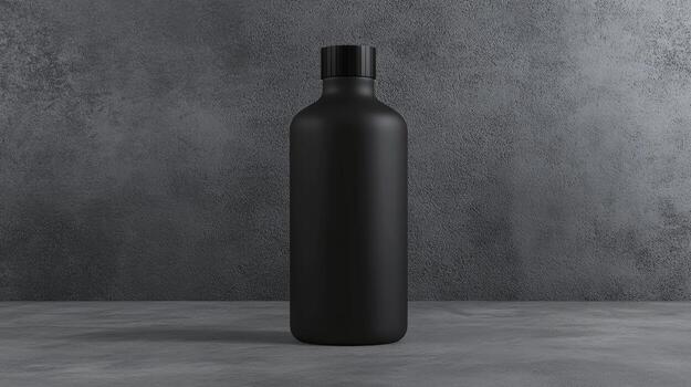 Black Matte Glass Bottle on a Gray Textured Background photo