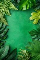 Assorted Green Leaves Framing a Vibrant Emerald Stone Surface photo