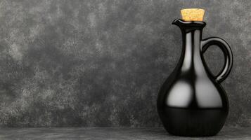 Sleek Black Bottle with Cork Stopper on a Textured Dark Gray Surface photo