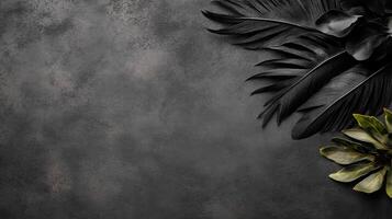 Black Feathers and Green Leaves on a Dark Textured Stone Surface photo