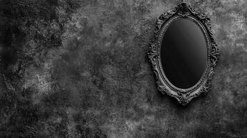 Ornate Oval Mirror with Carved Frame on a Textured Grayscale Stone Wall photo