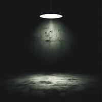 Single Pendant Lamp Illuminating a Grungy Concrete Wall and Floor Dimly photo