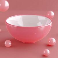 Empty Pink Bowl Surrounded by Glossy Pink Spheres on Matching Surface photo