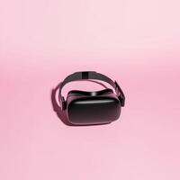 Black Virtual Reality Headset Resting on Plain Bright Pink Surface Background photo