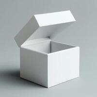 open cardboard white clean gift box on gray background photo