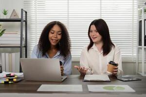 Empowered Teamwork and Networking. Colleagues sharing insights in a contemporary office setting. photo