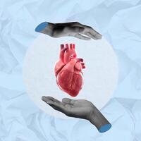 Heart and Wellness. Two hands supporting a heart, representing compassion and care in health. photo