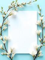 white square card is framed by delicate white flowers with yellow centers against a soft blue background photo