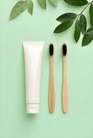 Eco-friendly oral care set with bamboo toothbrushes and natural toothpaste photo