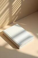 Blank white book with subtle shadows photo