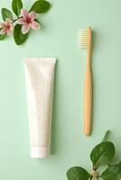 Eco-friendly oral care set with bamboo toothbrush and natural toothpaste photo