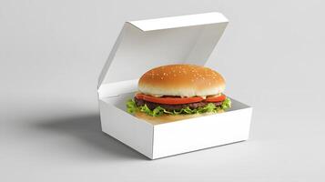 Delicious Cheeseburger in a White Cardboard Box Fast Food Meal Take Away photo