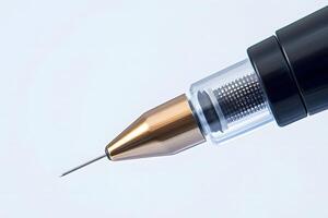Close up of a Precision Drafting Pen with Gold Tip and Transparent Mechanism photo