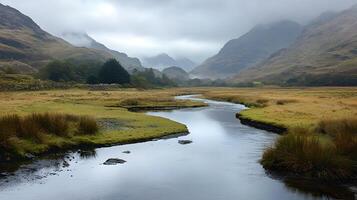 Serene River Winding Through Misty Mountain Valley Landscape photo