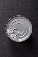 Large cylindrical can with canned food photo