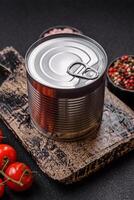 Metal can with canned food photo