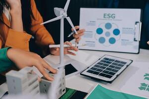 People working on a project with an esg logo photo