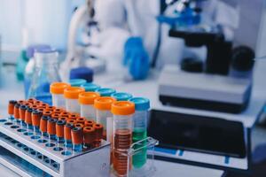 A laboratory with test tubes and a microscope photo