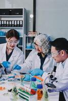 Group of scientists working in a laboratory photo