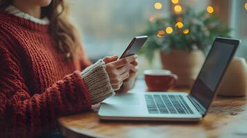 Digital marketer testing mobile-friendly ad creatives, smartphone and laptop setup photo