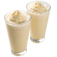 Two Creamy Vanilla Milkshakes Topped with Whipped Cream in Short Glasses png