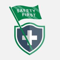 Shield symbol with the words safety first for worker protection vector