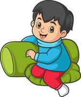 a boy sitting on a pillow and smiling vector
