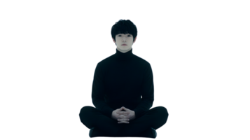 A serene individual meditating in a modern abstract setting with layered geometric patterns png