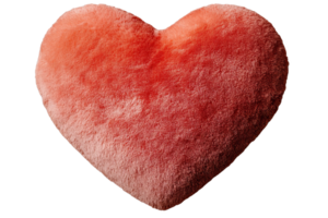 Plush heart pillow in soft coral color, perfect for decoratind cozy atmosphere. png