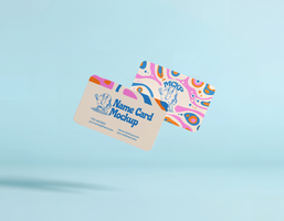 Two stylish name card mockups with playful designs float against a pastel blue background psd