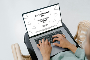 Man Using Laptop with Modern Design Mockup psd