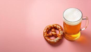 Beer and Pretzels A pint of beer with a pretzel on the side, isolated on the pastel color photo